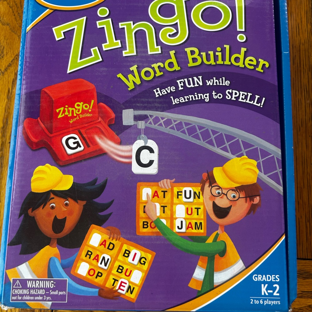 Think! Zingo! Word Builder Purple Game Box with Yellow and Red Accents